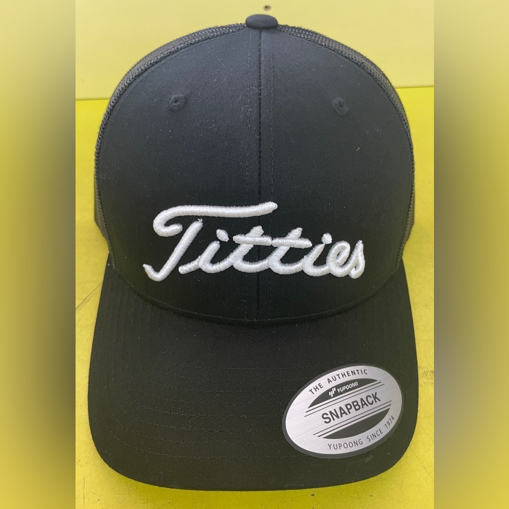 T Hat